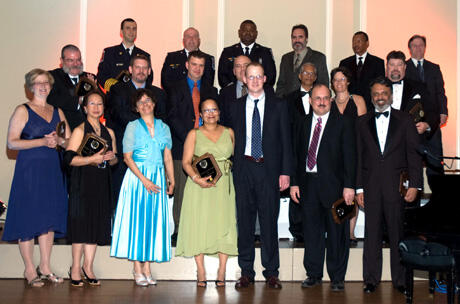 Front row from left: Lindy Creasey, dietician; Benedicta Casupanam, R.N., OR; Stephanie Hamilton, chaplain; Yolanda Guthrie, clinical social worker; William Christie III, patient; Wilhem Zuelzer, M.D., Orthopaedics; Ajai Malhotra, M.D., Trauma. Middle row from left: Robert Hawkins, RT; Greg Chenault, Pharm.D.; Charles Fields, M.D., chief resident; Tim Perkins, R.N., STICU; Rao Ivatury, M.D., trauma medical director; Tanya Huff, R.N., STICU; James McConnell, RT. Back Row from left: Chief Dennis Hales, paramedic, Chesterfield EMS; Capt. Mike Hite, paramedic, Chesterfield EMS; Capt. Vincent Urguhart, paramedic, Chesterfield EMS; Gareth Reeves, R.N., E.D.; Silas Shaw, ORT, OR; and Lynnwood Stallings, M.D., Anesthesia. 

Photo courtesy of VCU Trauma Program
