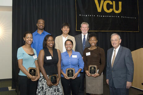 Photo: Front row from left: Amber Westbrook, Ashley Smith, Joann White, Shanae Moore and VCU president Dr. Eugene P. Trani. Second row: Calvin Cropper, Jr., Dong Hyok-So and Dr. Stephen D. Gottfredson, provost and vice president for academic affairs.

Photo by Jennifer Watson, VCU Creative Services