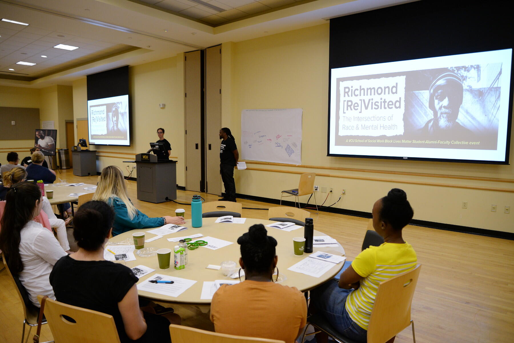 M. Alex Wagaman, Ph.D., assistant professor in the School of Social Work, and Daryl V. Fraser, associate professor in teaching in the School of Social Work, introduce the students to Richmond [Re]Visited 2018: The Intersections of Race & Mental Health.