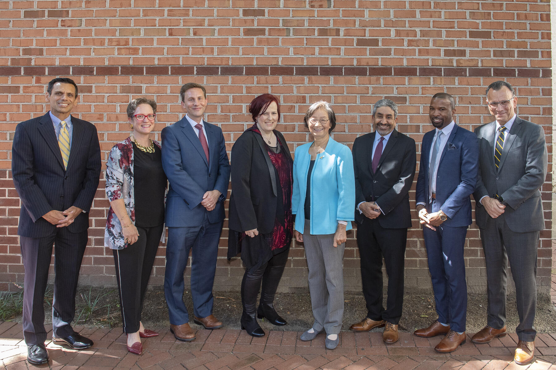 VCU President Michael Rao, far left, and Provost Fotis Sotiropoulos, far right, with the 2021 faculty convocation honorees (from left): Peyton Rowe, Alan Dow, Jeanine Guidry, Pin-Lan Li, Omar Abubaker and LaRon A. Scott.