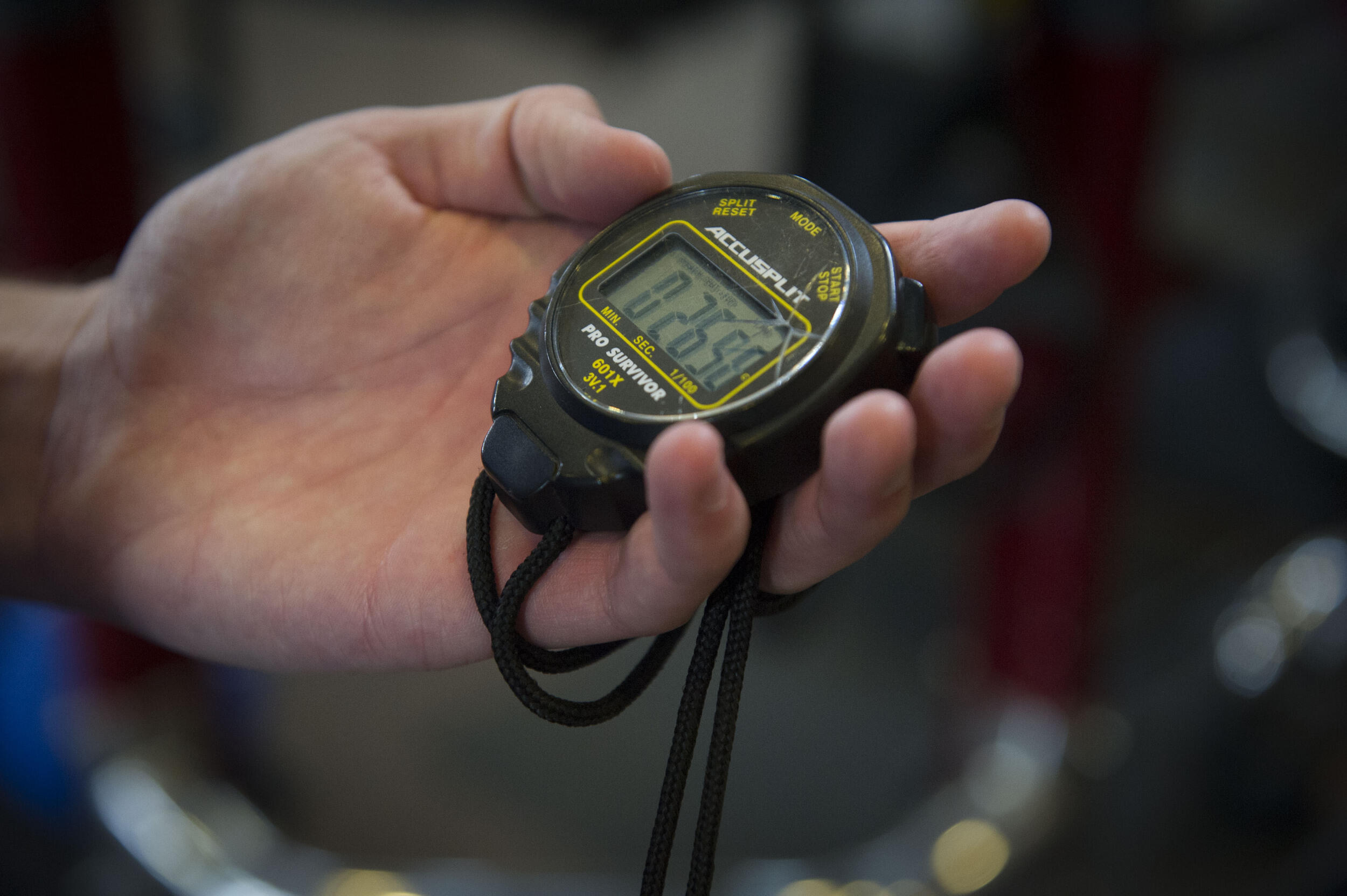 Imthurn tracks his clients' workouts with a stopwatch. (Julia Rendleman, University Marketing)