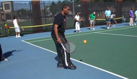 Serving others: Marques Baytop, a teacher from Carver Elementary School, strengthens his game and his ability to reach out to his students during the daylong training session.  Photo provided by Christopher Atwater.