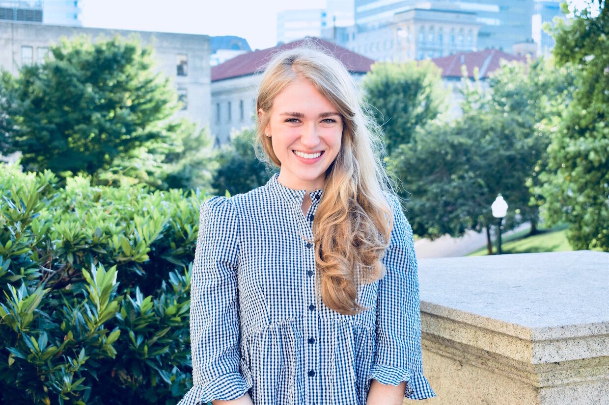 VCU student Brooke Danielsson standing at the Virginia State Capitol.