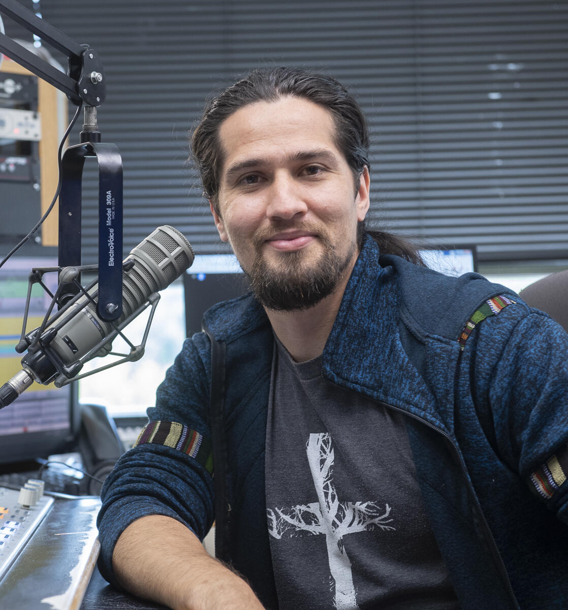 Oscar Contreras in the studio at Radio Poder 1380 AM