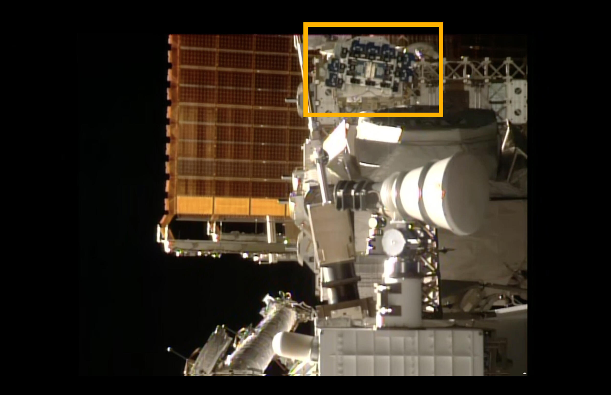 A close up of a section of the international space station. 