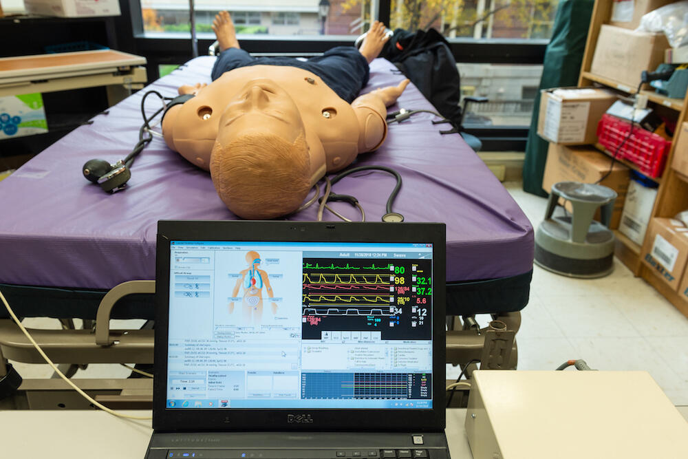 Readings of vitals from SimMan. The patient simulator is used in opioid overdose education at the VCU School of Pharmacy. (Photo by Kevin Morley, University Relations)