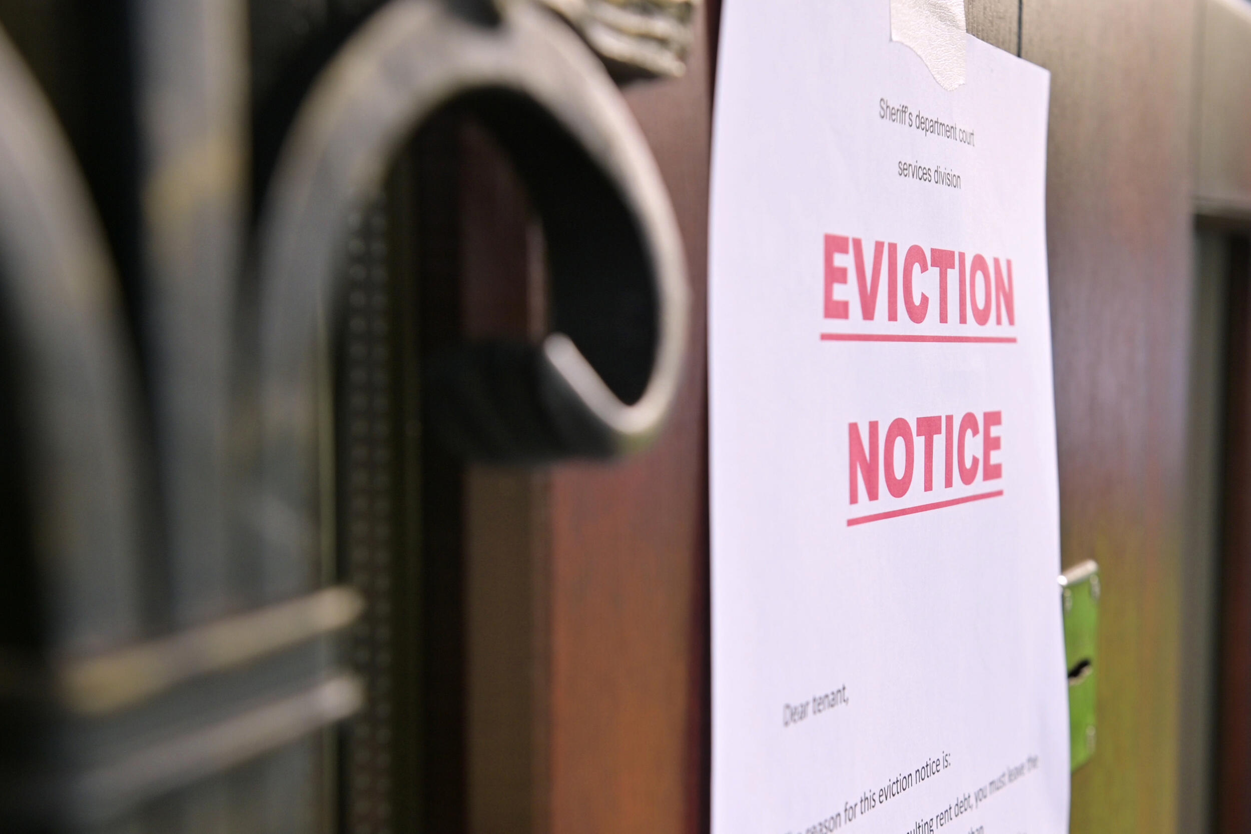 An eviction notice posted on a door 