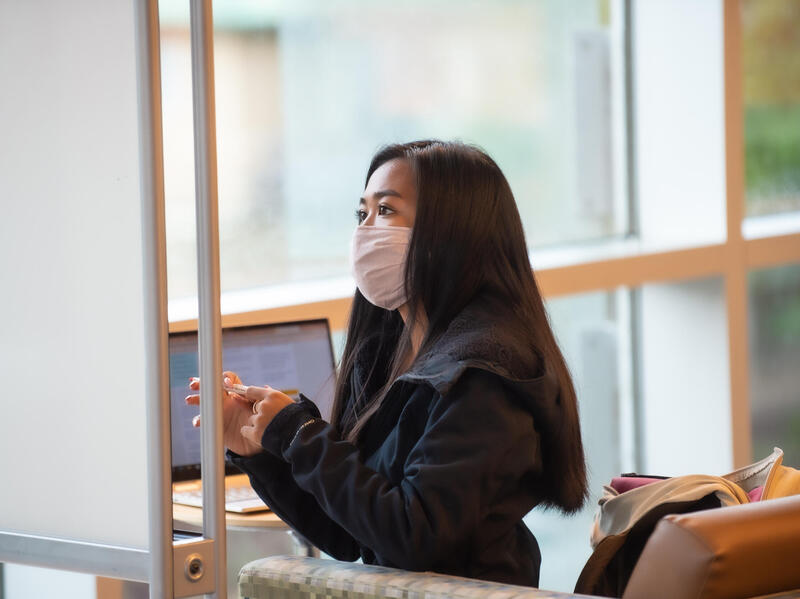 VCU student Anber Abab studying last fall inside James Branch Cabell Library. 