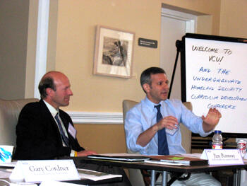 James Ramsey, Ph.D., coordinator of the homeland security program at Embry-Riddle Aeronautical University (left) and William Newman, Ph.D., undergraduate program coordinator of homeland security and emergency preparedness program at VCU’s L. Douglas Wilder School of Government and Public Affairs, served as panelists during the Undergraduate Homeland Security Curriculum Development Conference.  Photo by Mike Porter, VCU Office of University News Services