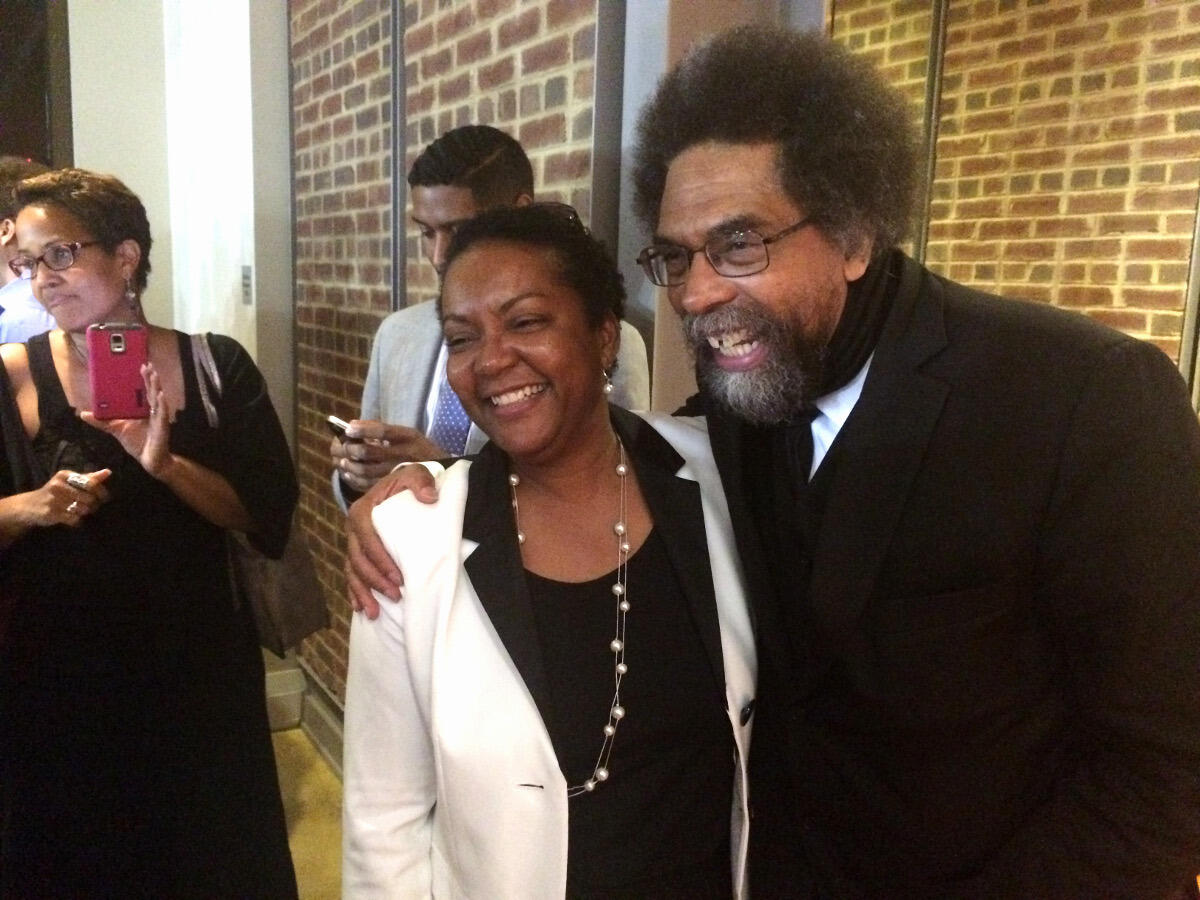 Cornel West, Ph.D., poses for a photo with Idella Glenn, Ph.D., director for diversity education with VCU's Division of Inclusive Excellence.