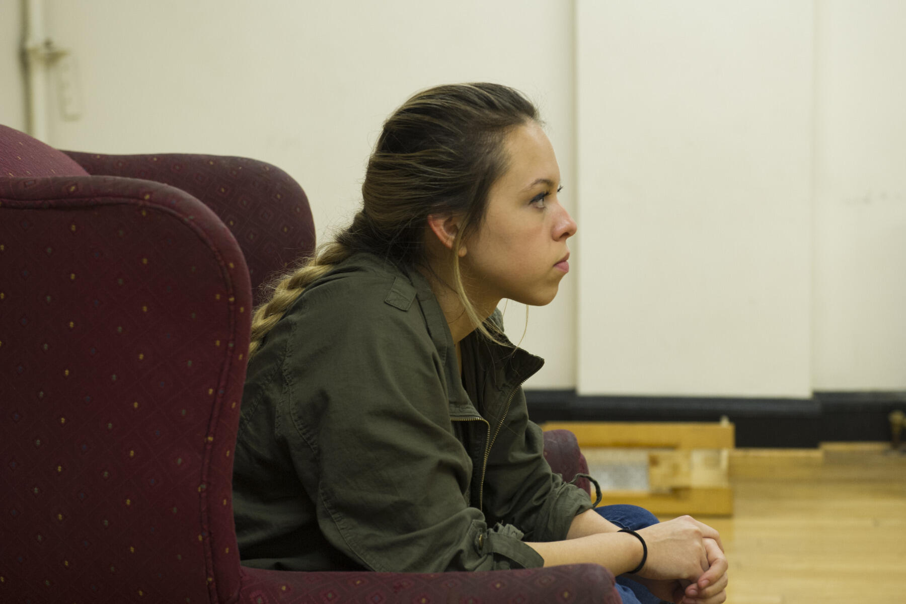 Co-director Sarah Velasco-Kent, a sophomore theatre performance major, listens during a rehearsal of "Writing Our Way Out.