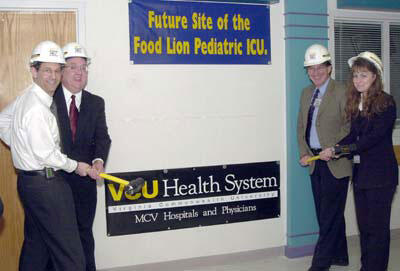 From left: Dr. Sheldon Retchin, senior executive vice president and CEO of the VCU Health System; Mark Adkins, Food Lion store operations supervisor; Dr. Joe Laver, chair Department of Pediatrics; Lisa Powers, Food Lion district manager.

Photos by Tommy Bishop, VCU Creative Services