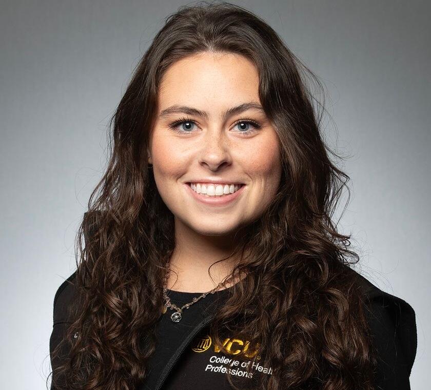 A photo of a woman from the shoulders up.