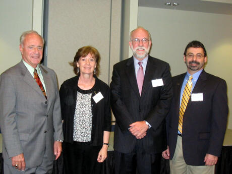 Celebrating the School of Social Work’s partnerships with the community:  From left, School of Social Work Dean Frank Baskind; Randi Buerlin, M.S.W., assistant director of field instruction, School of Social Work; keynote speaker Paul D. McWhinney, A.C.S.W., interim deputy chief administrative officer for human services and director of social services for the City of Richmond; and Timothy L. Davey,Ph.D., associate dean of community engagement, School of Social Work.