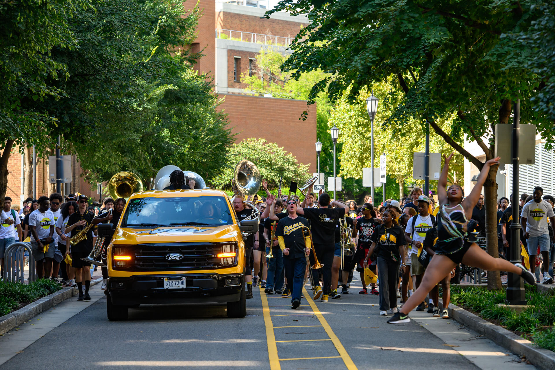 A parade heads down the street.