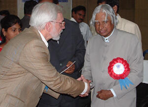 Ansello (left) meets former Indian President A.P.J. Abdul Kalam, who delivered opening remarks at the conference.  Photo provided by Edward Ansello.