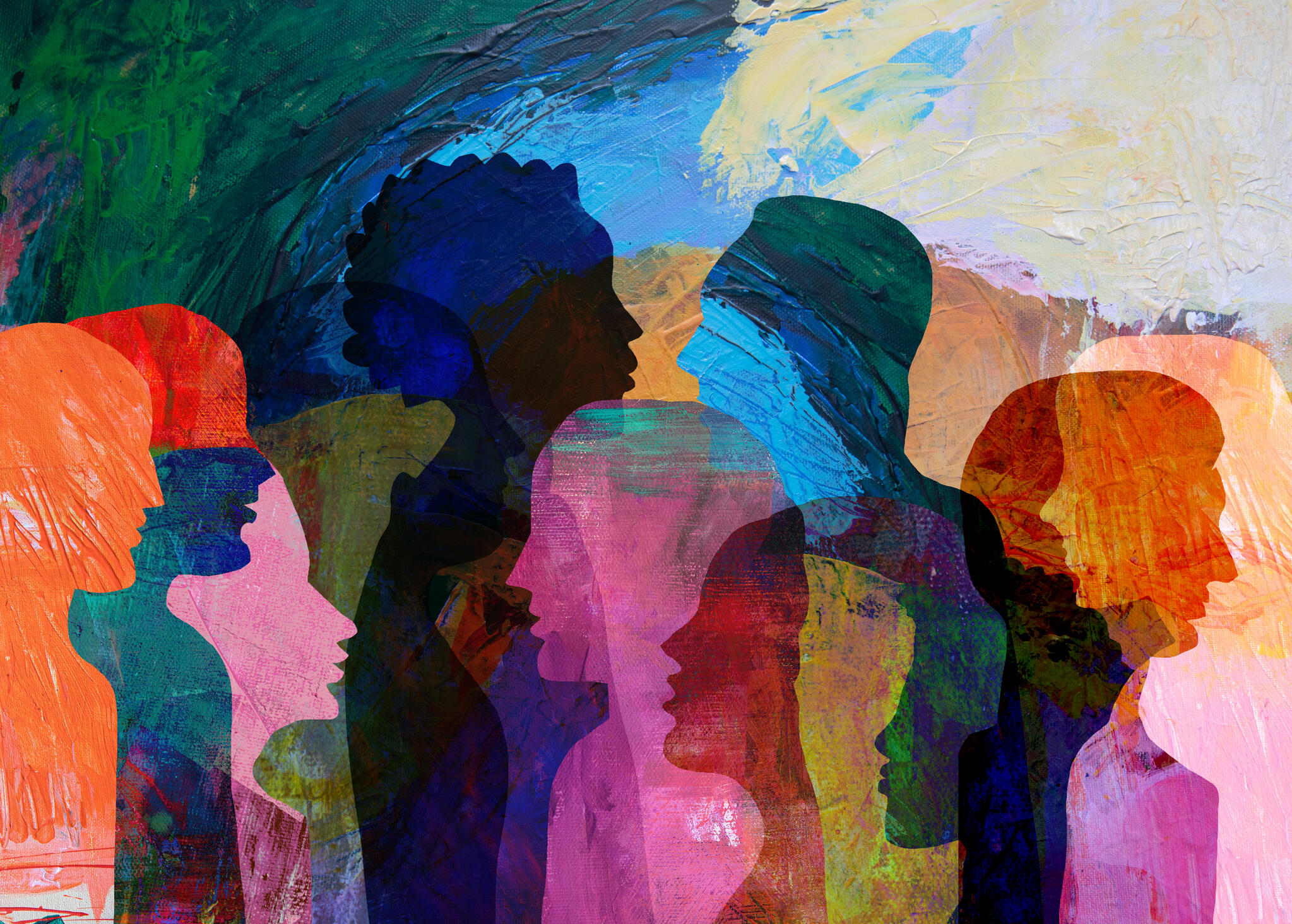 A photo of multiple human silhouettes in different colors.