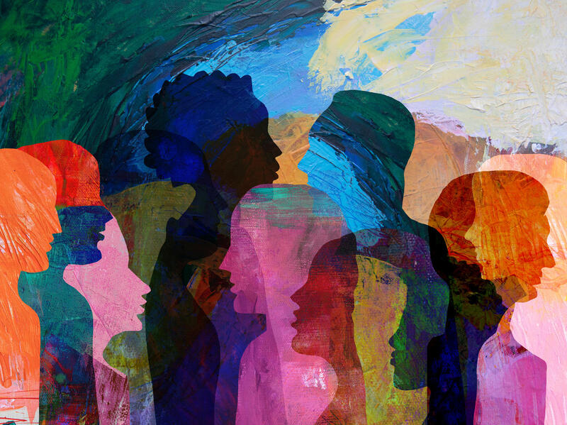 A photo of multiple human silhouettes in different colors.