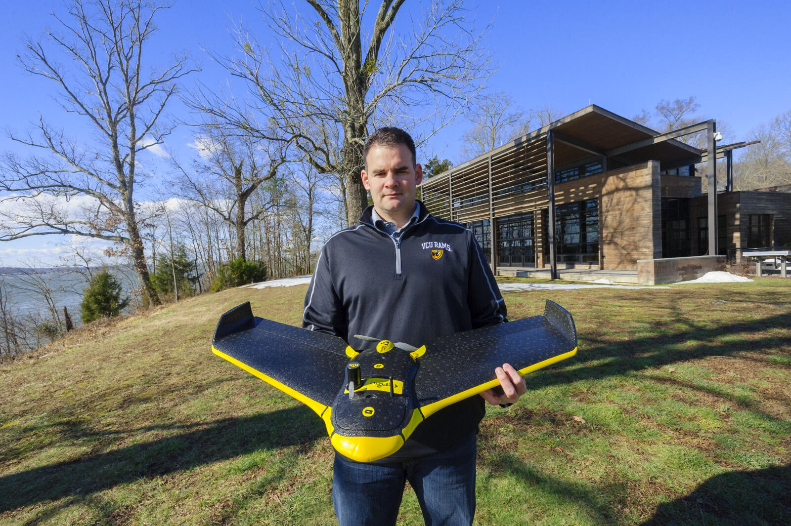 Will Shuart, Ph.D., and the Rice Rivers Center’s recently purchased drone, which along with the flux tower gives researchers a more holistic view of what's happening in the wetlands.
