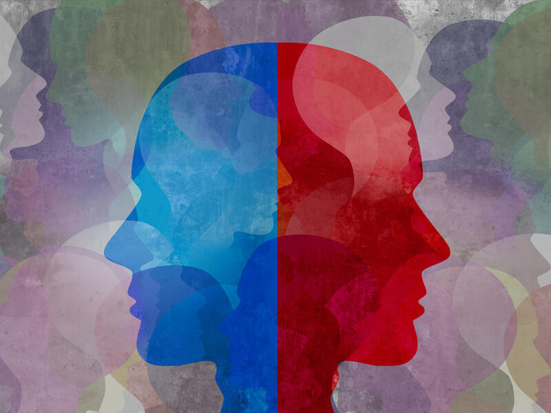 A drawing of facial figures depicting the multiple sides of one's personality.
