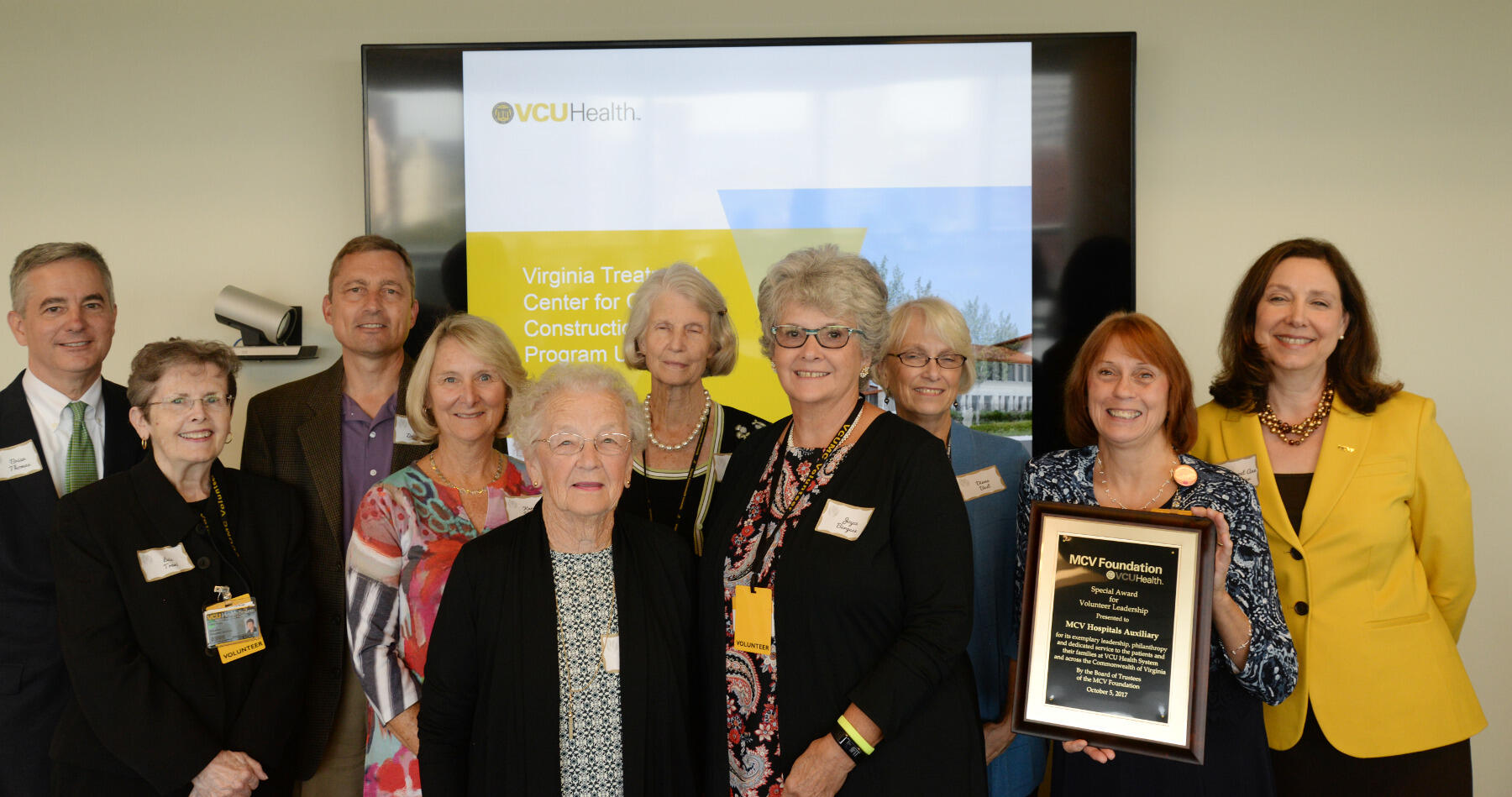 Ginny Little, president of the MCV Hospitals Auxiliary, stands with Margaret Anne Bollmeier, MCVF president and other members of the MCV Hospitals Auxiliary.