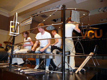 It’s a sculpture. It’s a musical instrument. And it’s a crowd-pleaser! Students who created The Multimedia Art Advocacy – “aMUSEment” research project perform for the crowd.  Photo by Mike Porter, VCU Communications and Public Relations.