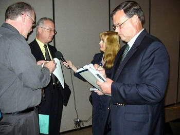 VCU political expert Robert D. Holsworth, Ph.D., (second from the right) interim dean of the College of Humanities and Sciences and director of the L. Douglas Wilder School of Government and Public Affairs, provides instant analysis following the debate between the candidates for lieutenant governor with reporters Anne Marie Morgan (clockwise), Virginia Public Radio, Bob Gibson, Charlottesville’s Daily Progress and Bob Lewis, the Associated Press. 

Photo by Michael Ford, University News Services
