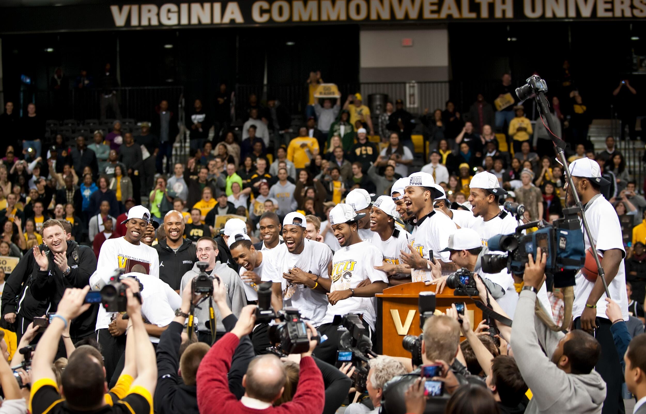 VCU basketball players celebrate at a homecoming event before they travel to the 2011 Final Four.