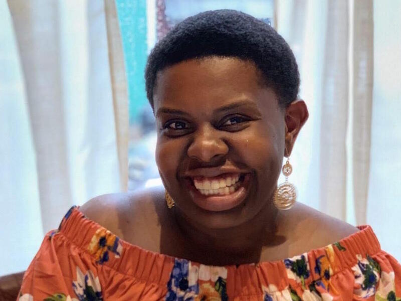 A portrait of a smiling Alisha Robinson.