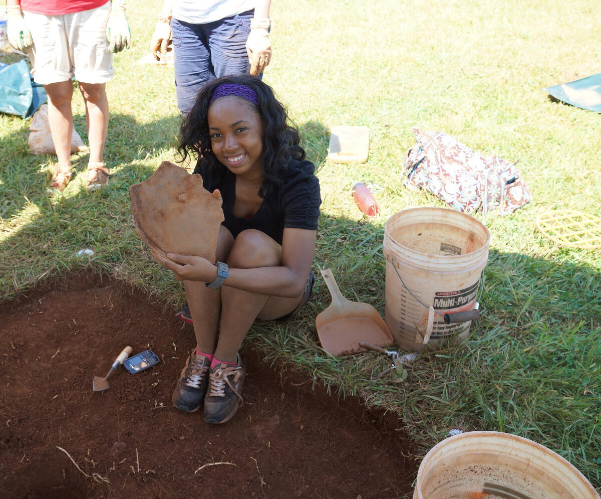 Michelle Taylor takes part in an archaeological dig to excavate artifacts from the field slave quarters at Montpelier, the home of James Madison.