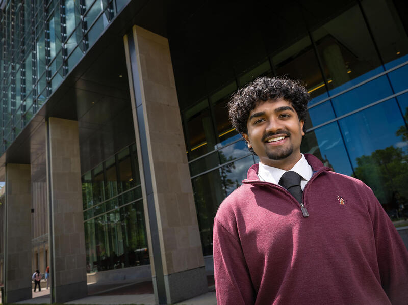 A photo of a man from the waist up. 