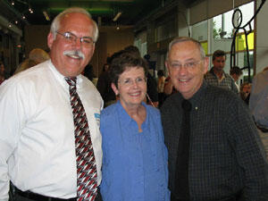 PICU Supporters. Dwayne Gilley (left), vice president of Food Lion's Northern Division, Mrs. Lois Trani and VCU President Dr. Eugene Trani look forward to the next PICU celebration, in December, when construction on a new unit is scheduled to be finished. Food Lion donated $1 million to renovate the PICU at VCU Medical Center and provided food for the 25th anniversary celebration.