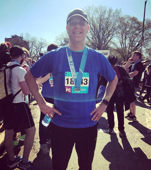 Kyle Schwandt stands after finishing the Monument Avenue 10K Race in April.
<br>Contributed photo