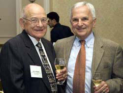 From left: Henry Addington, a 1951 alumnus from the School of Pharmacy who established a scholarship in the school, speaks with Dr. Victor Yanchick, dean of the School of Pharmacy.
