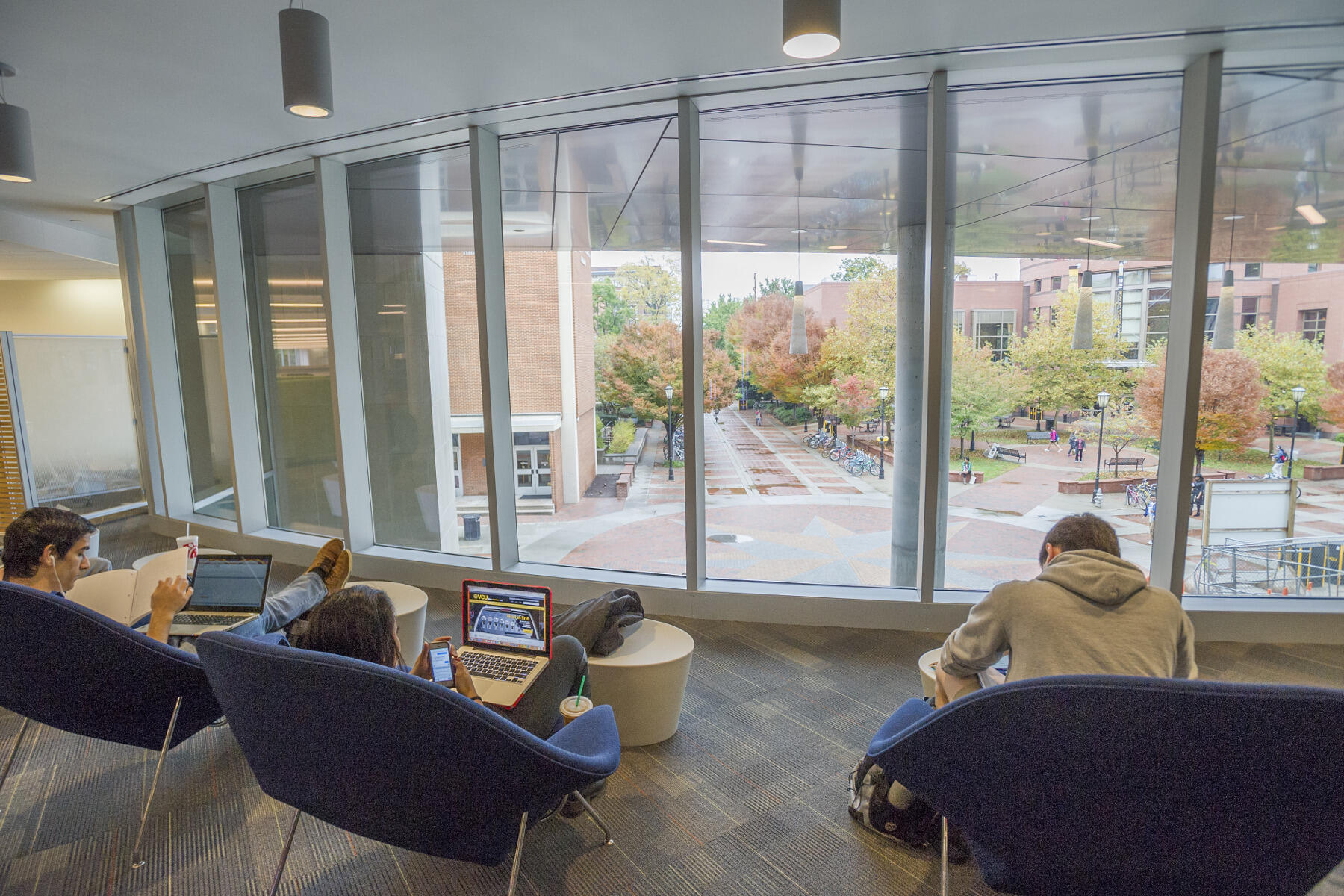 On Monday, students studied on the new library's second floor, overlooking the Compass.