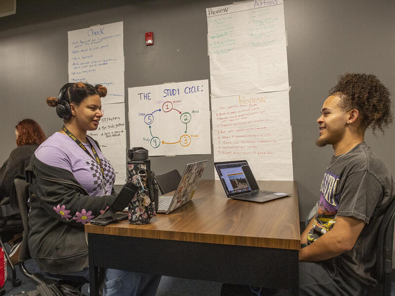 Yas Drawns (left) works with Darius Williams, a peer academic coach. Peer Academic Coaching, which is part of the Campus Learning Center, pairs students trained as academic coaches with freshmen for individual or ongoing sessions. (Tom Kojcsich, Enterprise Marketing and Communications)