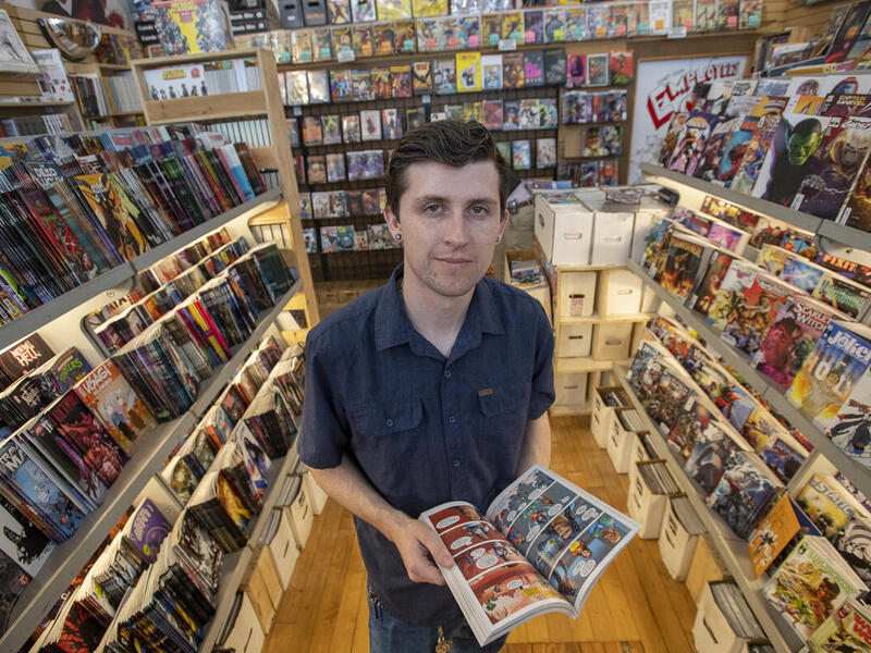 Fraser Trotter works part-time at Velocity Comics on Broad Street and as a tutor in VCU’s Department of Philosophy. (Photo by Tom Kojcsich, Enterprise Marketing and Communications.)