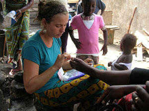 Kelly McCall, a VCU School of Social Work graduate, first visited Ghana with a class in January 2005. She was so inspired she went back the following August on her own for a six-month trip to support Sovereign Global Mission. McCall now works at the “Daily Planet,” where she assists Richmond’s homeless population. She’ll return to Ghana, her fourth trip, in January. Photo by: Kelly McCall.