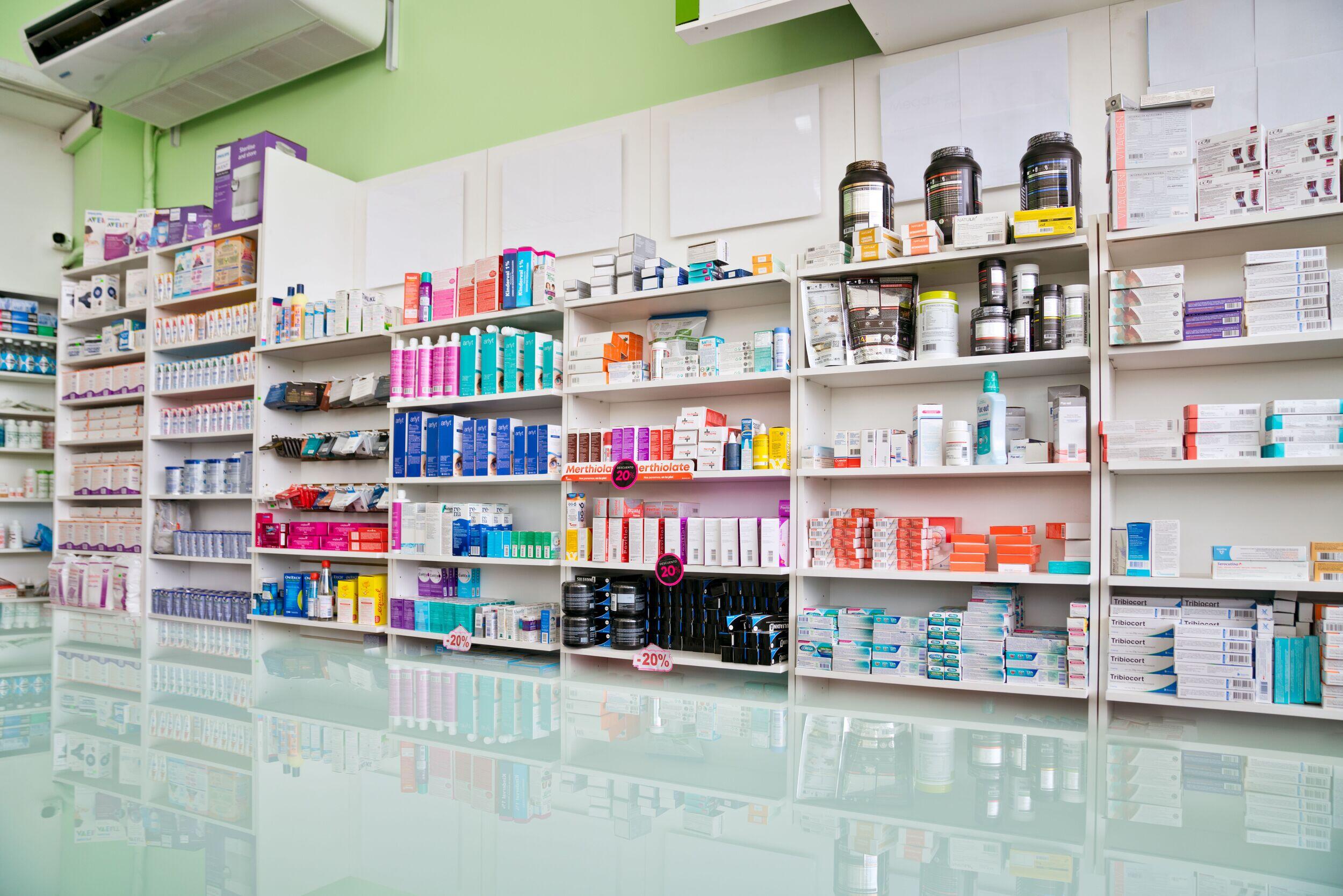 Shelves of medications in a pharmacy.