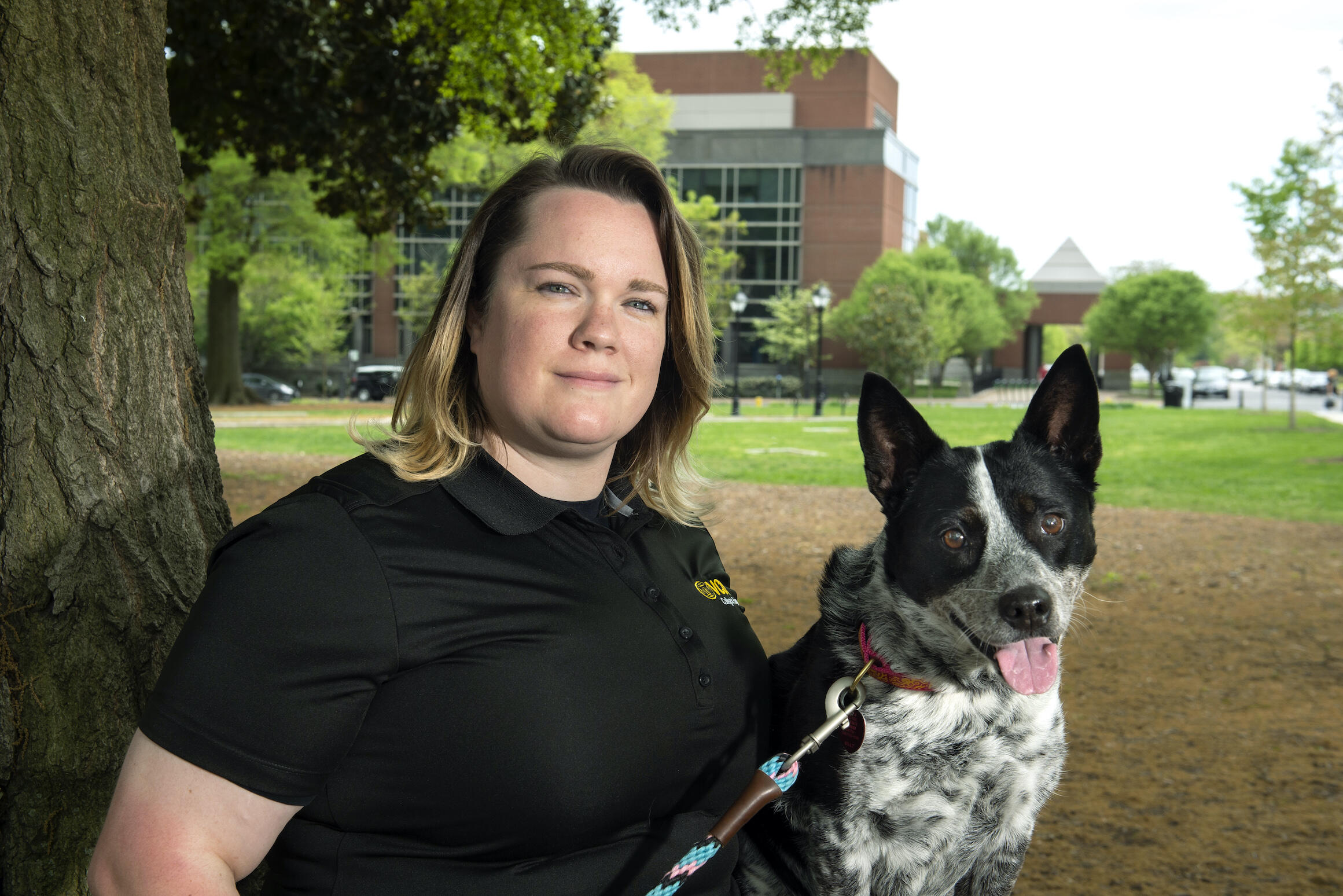 Ashley Lawrence and her dog, Roxie, in Monroe Park.