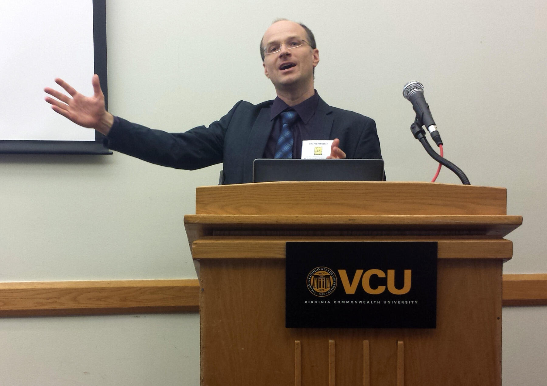 Ralph Buehler, an associate professor of urban affairs and planning at Virginia Tech’s Alexandria Center, speaks during the Bicycle Urbanism Symposium II at VCU.