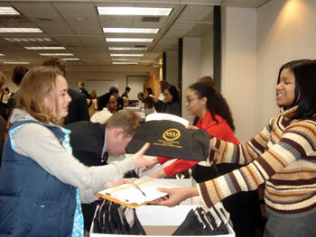 Prospective students receive information packets upon registration during the School of Medicine Open House.
 
Photo courtesy of Agnes Mack, VCU School of Medicine