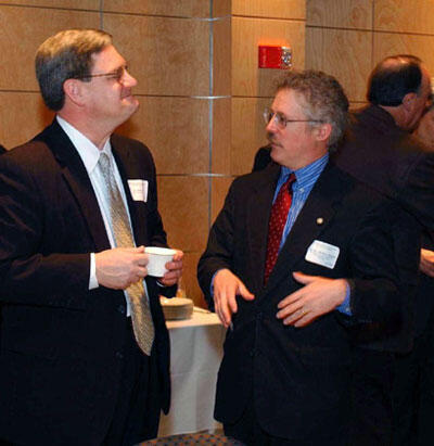 Michael J. Schewel (right), secretary of commerce & trade for the Commonwealth of Virginia, and Thomas Huff (left), vice provost for Life Sciences at Virginia Commonwealth University were among approximately 40 guests who attended Boehringer Ingelheim Pharmaceutical’s grand opening at the Virginia BioTechnology Research Park on March 28. BI Pharmaceuticals moved into its 6,540 square-foot, research-and-development laboratory in July 2002, joining sister company BI Chemicals, which has been a tenant of the park since 1996. The German company’s U.S. headquarters is in Connecticut.

Photo by Allen Jones, VCU Creative Services