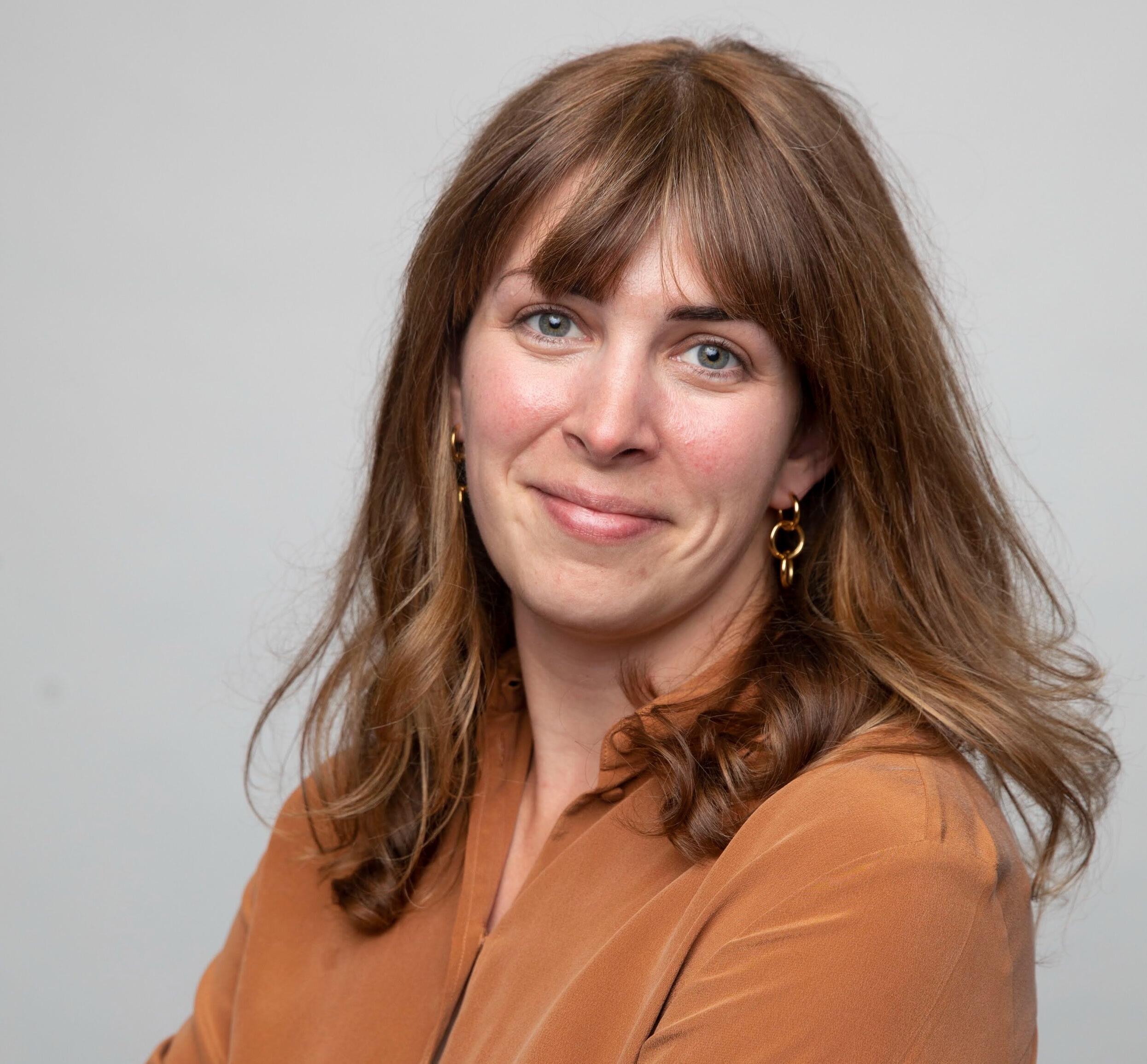 A photo of a woman from the shoulders up
