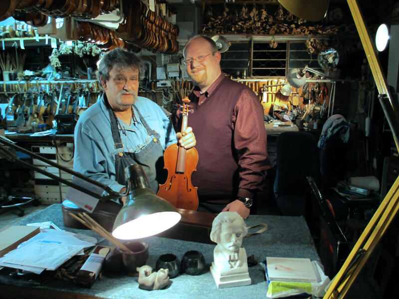 Jay Grymes visits Amnon Weinstein's workshop in Tel Aviv as part of his research on Violins of Hope.