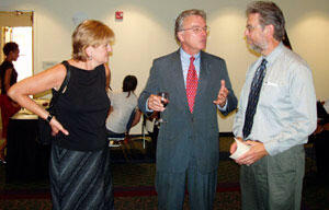 From left, Patricia Worley, director of Outreach Programs, Dr. Borgard and Dr. John Guthmiller, chair of VCU's department of Music, share a brief moment during the reception.