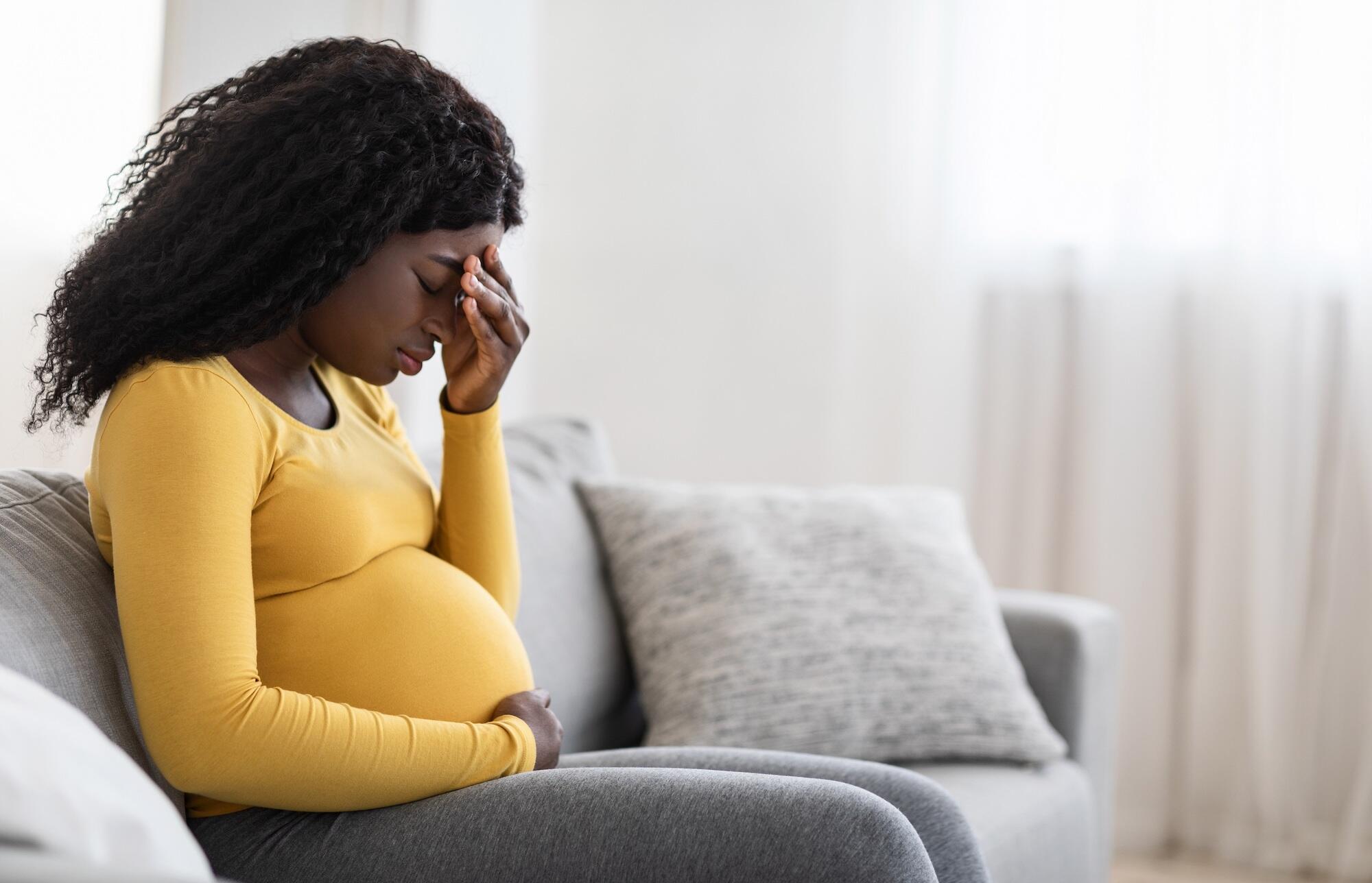 pregnant woman struggling with stress