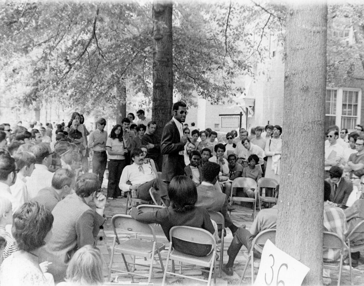 Charles McLeod addresses a group in front of a VCU administrative building in May 1969.