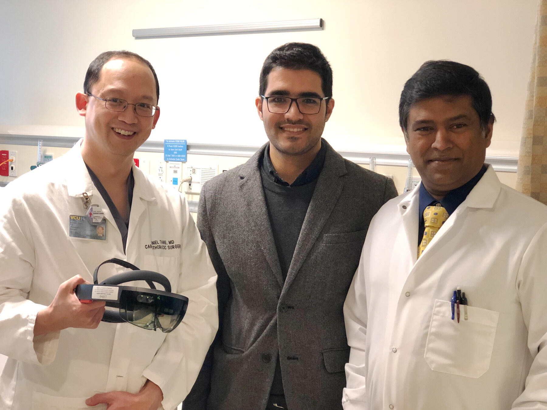 Dan Tang, M.D., Ali Panahi, computer sciences graduate student, and Dayanjan “Shanaka” Wijesinghe, Ph.D., have worked together to develop AR technology for medical use.