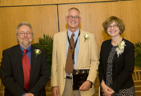 David C. Wojahn (left) received the University Distinguished Scholarship Award; Jeffrey C. South received the University Distinguished Teaching Award; and Mary Ellen Olbrisch received the University Distinguished Service Award during the 26th Opening Faculty Address and Convocation ceremony Sept. 16. The University Award of Excellence was awarded posthumously to Billy R. Martin, Ph.D. Photos courtesy VCU Creative Services